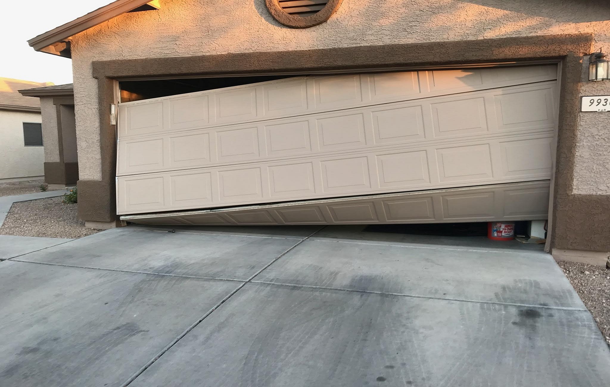 Three Serious Reasons to Reconsider DIY Garage Door Repair image door-doctor-garage-door-repair-service Three Serious Reasons to Reconsider DIY Garage Door Repair