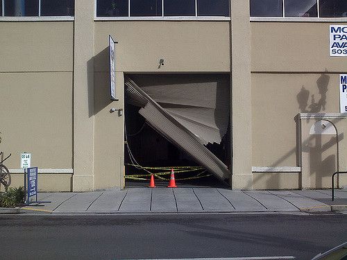 Common Garage Door Problems Faced By Homeowners image door-problem Common Garage Door Problems Faced By Homeowners